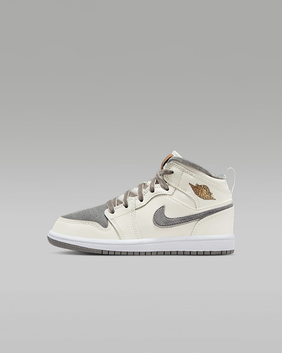 Chaussure Jordan 1 Mid SE pour enfant. Nike CH